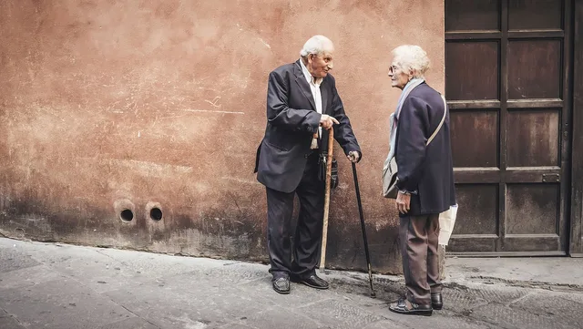 people, old, elderly, man, woman, talking, outside, house, brown house, brown talk, brown talking, brown elderly, brown old, elderly, talking, talking, talking, talking, talking. Comparing community costs with observed member outcomes