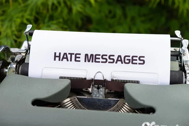 typewriter, hate messages, hatred, internet, bullying, harassment, online, cyberspace, criticize, discriminate, attack, social media, word. Distinguishing disagreement from harassment